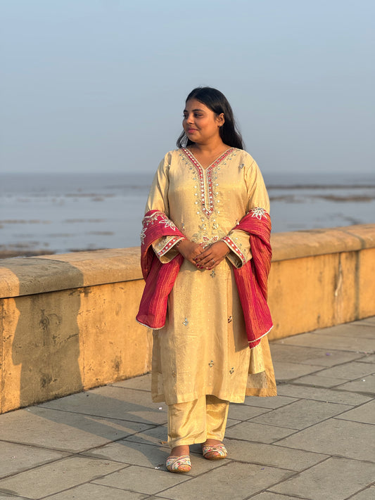 Heavy Lotus Work  Party And Wedding Wear Premium Tissue Silk Suit .